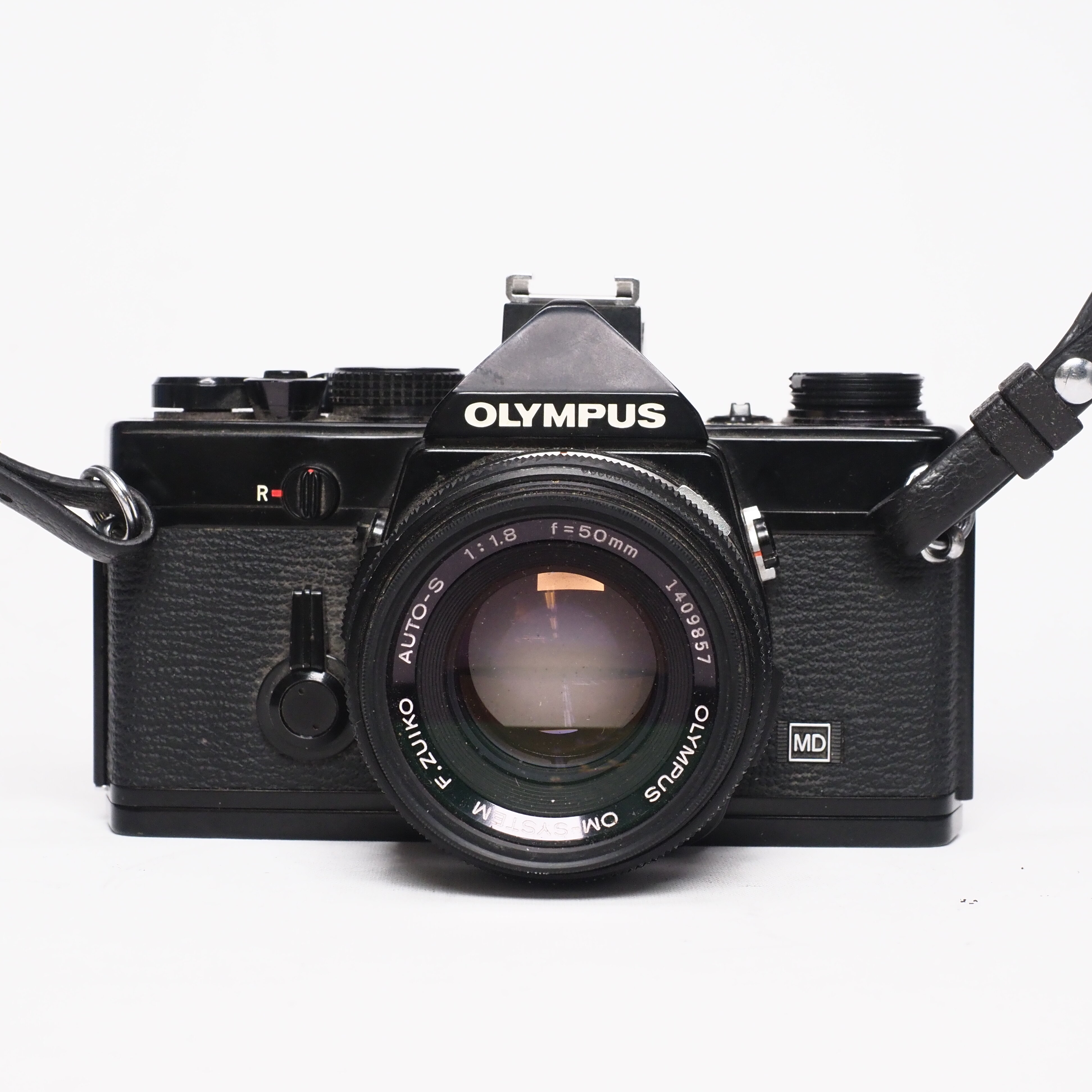 Olympus OM-1n + f.zuiko Auto-S 50mm f/1,8 - Bagagnad